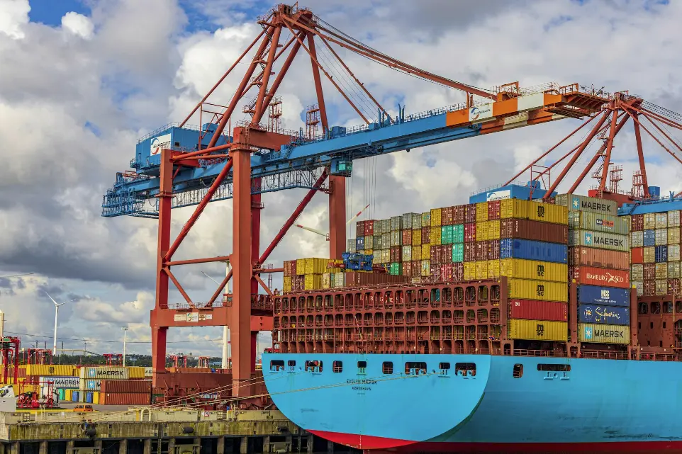 blue and red cargo ship